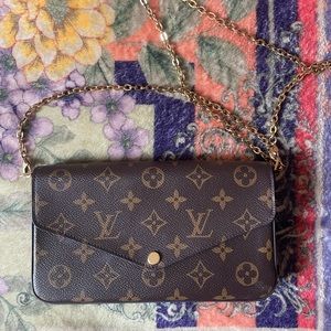 Louis Vuitton clutch cross body bag